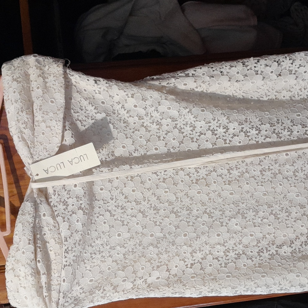 I'm selling a vintage wedding dress. From Luca Luca